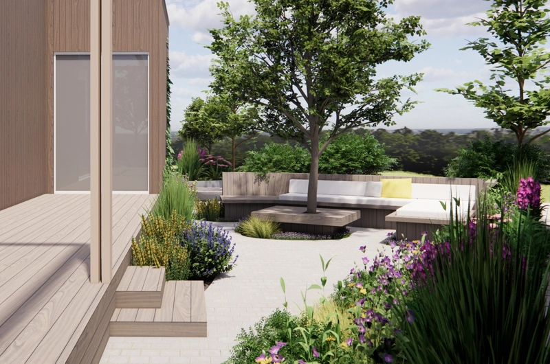 Moderni puutarhapiha Oulussa, jossa dynaaminen istutusalue ja huoliteltu pihakiveys.