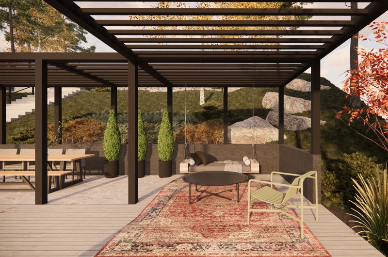 Moderni uudiskohteen rinnepiha Turussa – pergola, terassi, pihamuuri ja viihtyisä oleskelupiha osana pihasuunnittelijan toteuttamaa pihasuunnitelmaa.